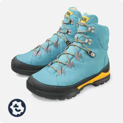 A pair of blue Bergkomfort hiking boots 2.0 with black-yellow sole and sturdy laces for outdoor activities