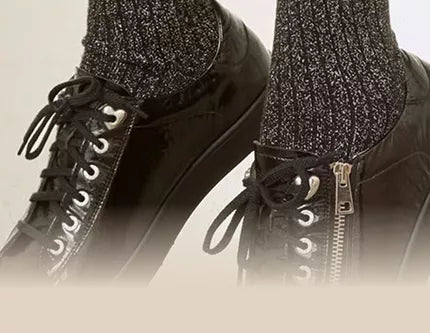 Black, glossy shoes with zipper and laces for hospitality professionals