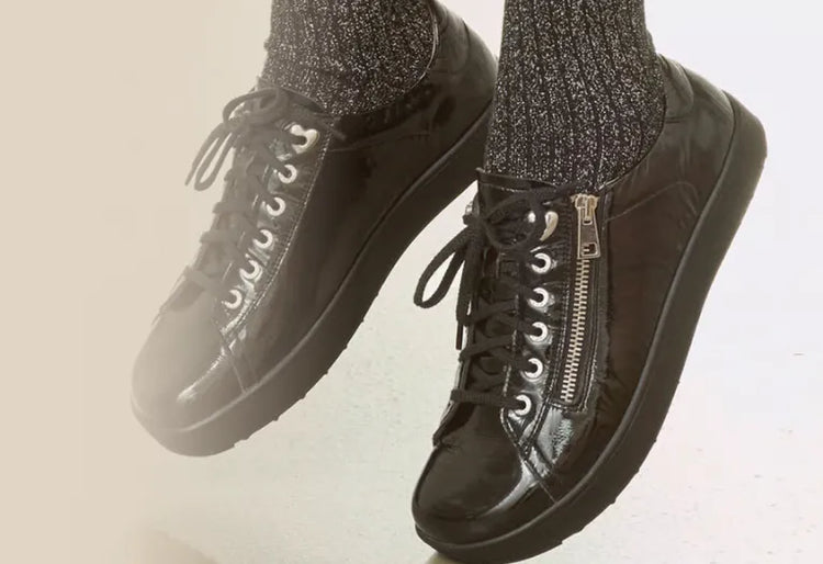 Black, glossy shoes with zipper and laces for hospitality professionals
